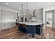 Bright kitchen features a large island with seating and modern stainless steel appliances at 2419 Paddlers Cove Dr, Clover, SC 29710