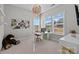 Bright office featuring a modern desk, large windows, and stylish décor at 2419 Paddlers Cove Dr, Clover, SC 29710