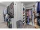 Well-organized walk-in closet with ample storage space and multiple hanging rods at 2419 Paddlers Cove Dr, Clover, SC 29710