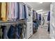 Spacious walk-in closet with custom shelving and ample storage for clothing and accessories at 2419 Paddlers Cove Dr, Clover, SC 29710
