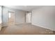 Bright bedroom with neutral walls, and soft carpet creating a warm and inviting space at 2534 Crimson Way, Monroe, NC 28112
