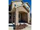 A charming front porch with stone pillars and a welcoming entrance create an inviting feel at 2534 Crimson Way, Monroe, NC 28112