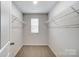Spacious walk-in closet with shelving for optimal storage and organization at 2534 Crimson Way, Monroe, NC 28112