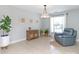 Bright dining area featuring neutral walls, tile flooring, and a large window for ample natural light at 2627 Bridgeville Ln, Charlotte, NC 28262