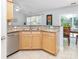 Modern kitchen with stainless steel dishwasher, and granite counter tops at 2627 Bridgeville Ln, Charlotte, NC 28262