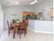 Kitchen and dining area with stainless steel appliances and lots of natural light at 2627 Bridgeville Ln, Charlotte, NC 28262