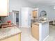 Kitchen featuring granite counters, stainless appliances, and an open layout at 2627 Bridgeville Ln, Charlotte, NC 28262