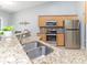 Kitchen featuring stainless appliances, granite counters, and a modern faucet at 2627 Bridgeville Ln, Charlotte, NC 28262
