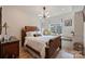Bedroom features unique lighting, and window seat with city views at 300 W 5Th St # 711, Charlotte, NC 28202