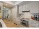Bright kitchen with stainless steel appliances, marble countertops, and ample cabinet space at 300 W 5Th St # 711, Charlotte, NC 28202