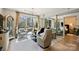 Inviting living room featuring a balcony view of the city, modern furniture, and hardwood floors at 300 W 5Th St # 711, Charlotte, NC 28202