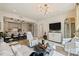 Stylish living space with a kitchen, sleek furniture, hardwood floors, and contemporary decor at 300 W 5Th St # 711, Charlotte, NC 28202