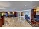 Well-lit lobby area with tiled floors, seating, and decorative features at 300 W 5Th St # 711, Charlotte, NC 28202