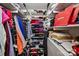 Spacious walk-in closet with ample shelving and storage for an organized wardrobe at 300 W 5Th St # 711, Charlotte, NC 28202