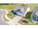 Charming single-story home boasts well-manicured lawn and concrete driveway leading to a two-car garage at 324 Aniston Ln, Shelby, NC 28152