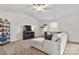 Spacious living room with vaulted ceilings, a ceiling fan, and ample natural light at 324 Aniston Ln, Shelby, NC 28152