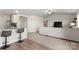 Open living area with bar seating and views into the kitchen at 324 Aniston Ln, Shelby, NC 28152