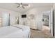Bright main bedroom features vaulted ceiling, ceiling fan and ensuite bathroom at 324 Aniston Ln, Shelby, NC 28152