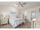 Spacious main bedroom with vaulted ceiling, ceiling fan and ensuite bathroom at 324 Aniston Ln, Shelby, NC 28152