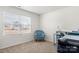Bright room featuring natural light, neutral walls, and a desk at 324 Aniston Ln, Shelby, NC 28152