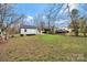 A spacious backyard offering ample green space for outdoor activities and relaxation at 345 Grice St, Shelby, NC 28150