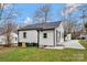 Charming home with a well-maintained lawn, freshly painted siding, and a newly poured concrete driveway at 345 Grice St, Shelby, NC 28150