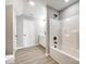 Well-lit bathroom featuring a tub, shower, sleek vanity, and modern fixtures, offering a relaxing space at 453 Cedar Grove Rd, Clover, SC 29710