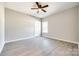 Large bedroom featuring wood-look floors, a ceiling fan and a window at 453 Cedar Grove Rd, Clover, SC 29710