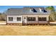 Charming farmhouse with a welcoming front porch and dormer windows at 453 Cedar Grove Rd, Clover, SC 29710