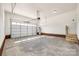 A spacious garage with an automatic door and ample room for vehicles and storage, blending functionality with style at 453 Cedar Grove Rd, Clover, SC 29710