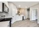 Modern kitchen with stainless steel appliances, white cabinets, and hard surface countertops at 453 Cedar Grove Rd, Clover, SC 29710