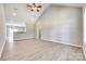 Open-concept living area with vaulted ceiling and modern finishes at 453 Cedar Grove Rd, Clover, SC 29710