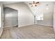 Spacious living room with stairs, leading to kitchen with breakfast bar at 453 Cedar Grove Rd, Clover, SC 29710