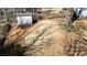 Spacious backyard featuring mature trees, providing shade for outdoor activities at 5124 Gates Dr, Denver, NC 28037