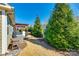 This backyard offers a covered patio, green trees and easy access to AC Unit at 5316 Baker Ln, Clover, SC 29710