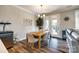 Dining area with modern table and chairs, plus a door leading to the backyard at 5316 Baker Ln, Clover, SC 29710
