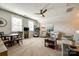 Inviting bonus room with seating area, table, treadmill, and plenty of natural light at 5316 Baker Ln, Clover, SC 29710