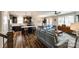 Open-concept living space with a kitchen island, dining area, and comfortable seating at 5316 Baker Ln, Clover, SC 29710