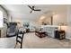 Cozy bonus room features seating, a table, a ceiling fan, and neutral color scheme at 5316 Baker Ln, Clover, SC 29710