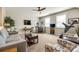 Spacious bonus room with plush seating, a ceiling fan, and plenty of natural light at 5316 Baker Ln, Clover, SC 29710