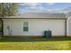 Side exterior of home, showing siding, window, AC unit, and utilities in a grassy yard at 544 Castlewood Cir, Rock Hill, SC 29730