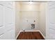 Empty laundry room with wood floors and hookups for a washer and dryer at 544 Castlewood Cir, Rock Hill, SC 29730