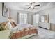 Airy bedroom with a ceiling fan, a white bed, and matching furniture sets at 582 Sixth Baxter Xing, Fort Mill, SC 29708