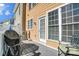 Picturesque deck with a grill, an umbrella, a table, seating and an entrance at 582 Sixth Baxter Xing, Fort Mill, SC 29708
