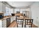 Modern kitchen with stainless steel appliances, granite countertops, and a central island at 582 Sixth Baxter Xing, Fort Mill, SC 29708