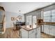 Bright kitchen with stainless steel appliances, granite countertops and a center island with dining space at 582 Sixth Baxter Xing, Fort Mill, SC 29708