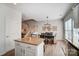 Open concept kitchen and dining area with island and stainless steel appliances at 582 Sixth Baxter Xing, Fort Mill, SC 29708