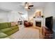 Inviting living room with fireplace, a leather chair, and neutral tones at 582 Sixth Baxter Xing, Fort Mill, SC 29708