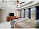 This bedroom features a trey ceiling and large windows allowing for great natural lighting and plush carpet at 582 Sixth Baxter Xing, Fort Mill, SC 29708