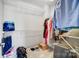 A well organized walk-in closet with ample shelving, storage, and carpeted floors at 582 Sixth Baxter Xing, Fort Mill, SC 29708